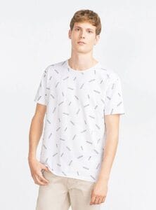 Casual team member in a patterned white shirt, symbolizing modern workplace culture, exclusively at Elevate Your Organization's Culture and Performance With CEEK.