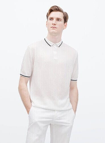 Casual team member in white attire, promoting modern workplace culture, only available at Elevate Your Organization's Culture and Performance With CEEK.