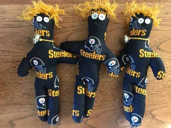 Three handmade Steelers-themed dolls with button eyes, available at Elevate Your Organization's Culture and Performance With CEEK.