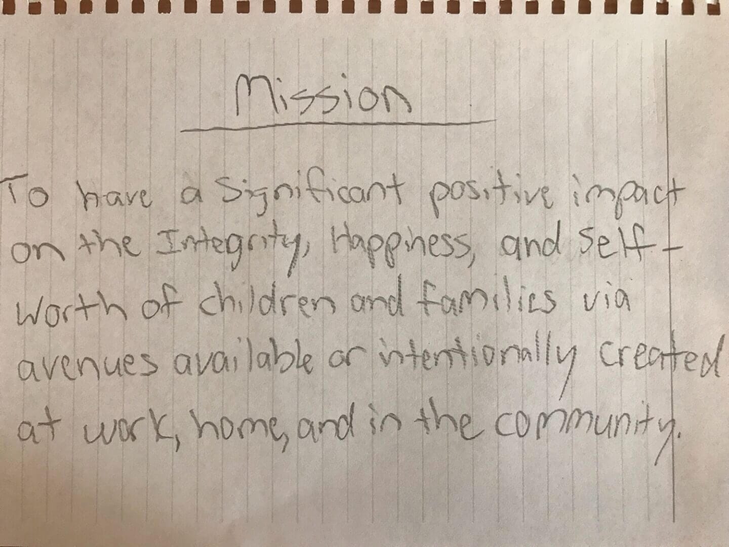 Handwritten mission statement on lined paper, emphasizing positive impact on children and families, featured at Elevate Your Organization's Culture and Performance With CEEK.