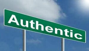 Authentic signpost under blue sky, symbolizing genuine culture, available at Elevate Your Organization's Culture and Performance With CEEK.