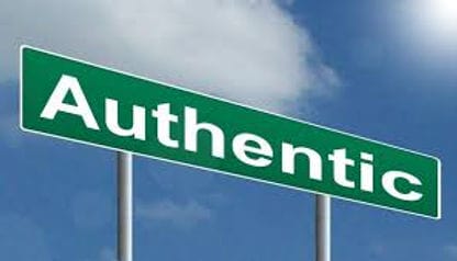 Authentic signpost under blue sky, symbolizing genuine culture, available at Elevate Your Organization's Culture and Performance With CEEK.