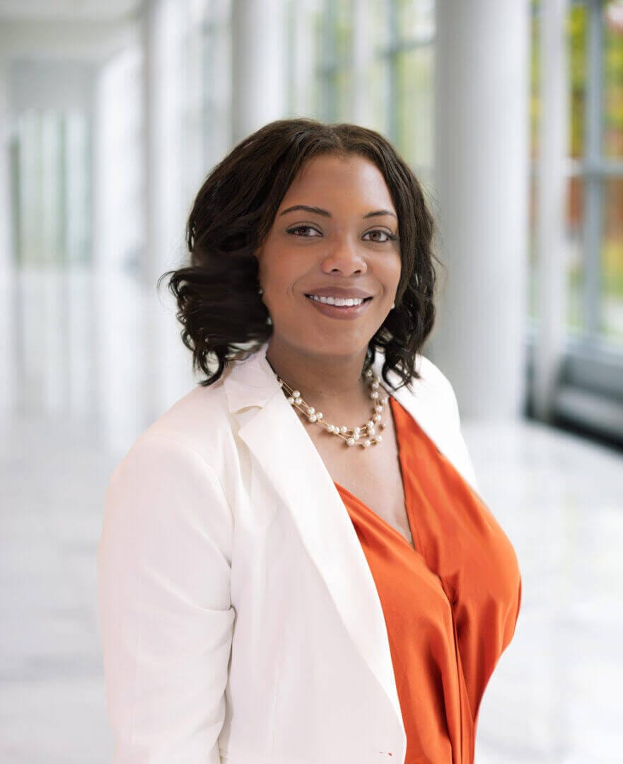 Professional woman in business attire, promoting leadership skills, available at Elevate Your Organization's Culture and Performance With CEEK.